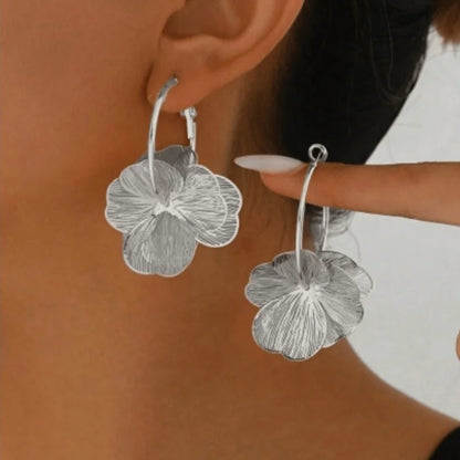 Pendientes flor dorada