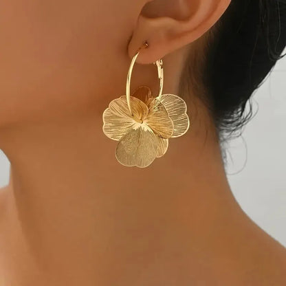 Pendientes flor dorada
