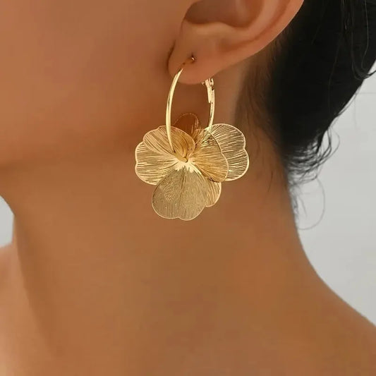 Pendientes flor dorada