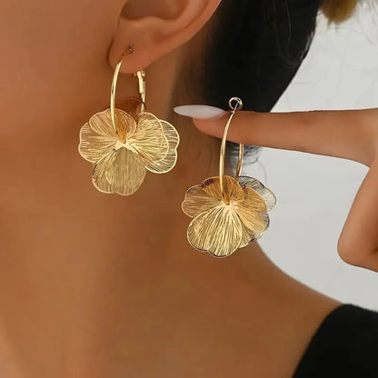 Pendientes flor dorada