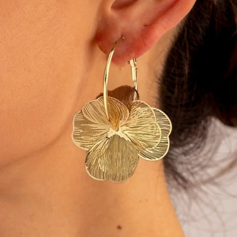 Pendientes flor dorada